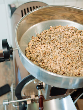 Hopper on coffee roaster full of beans