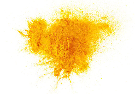 Turmeric powder pile isolated on white background, top view, clipping path