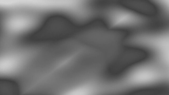 Abstract blurry gray pattern with dark organic shapes
