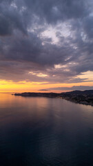 Fototapeta premium Sunset over coastline and islands in Corfu, Greece
