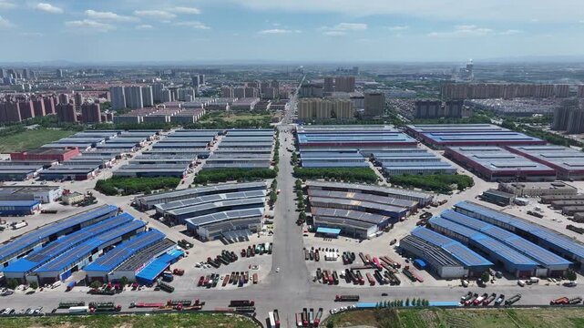 Aerial view of Rizhao industrial park with solar panel rooftops and orderly layout