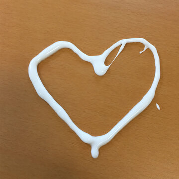a heart made of sloppy white glue