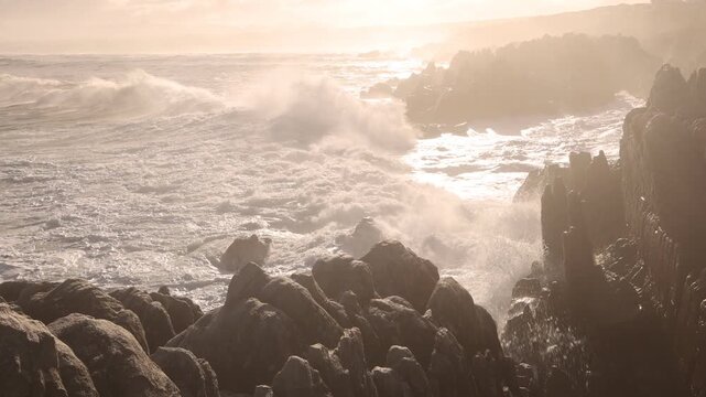 magnificent rocky coastline and waves, DeKelders, South Africa early morning