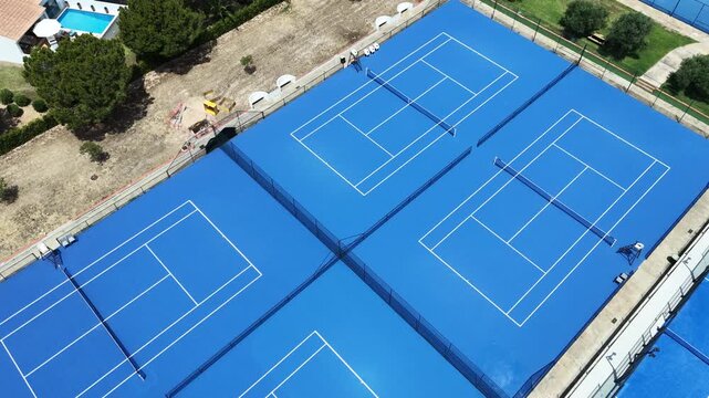 4K top-down aerial view on a tennis court 