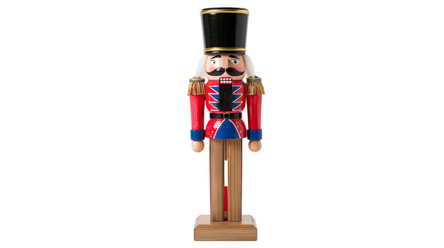 Traditional wooden nutcracker soldier with black hat and red uniform, isolated on transparent background