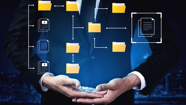 Businessman Holding Virtual Files with Folder Icons Displayed, Representing Data Management, Technology, and Information Organization in Modern Workplace Gluon.