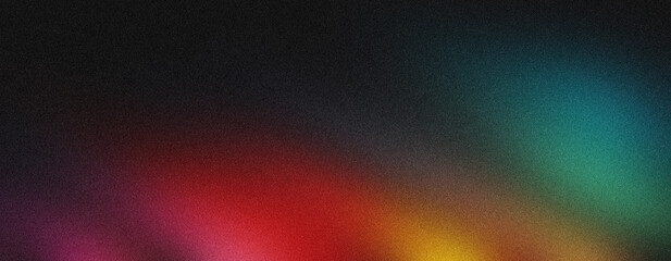 Abstract image with a dark, grainy texture showcasing a vibrant rainbow gradient light effect across bottom, creating a striking backdrop. © creativeart