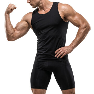 Muscular man in athletic black tank top and compression shorts flexing bicep showing strong fitness physique on white background