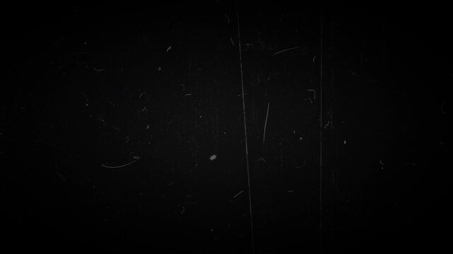Vintage Film Scratch Overlay Texture with Realistic Black Cinema Dust Scuffs Noise and Authentic Retro Movie Damage Effect Loop 4k video