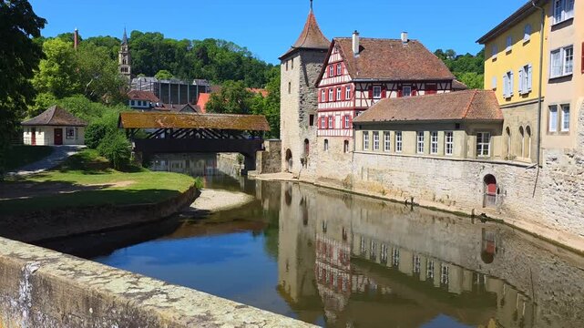 Beautiful Old Town of Schwabisch Hall, Germany with riverside medieval houses, tower and covered bridge