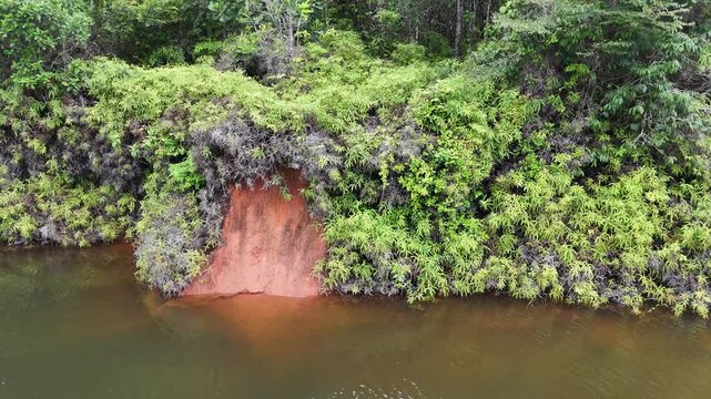 Aerial flight over flooded Amazon rainforest islands at Petit Saut Lake, French Guiana.