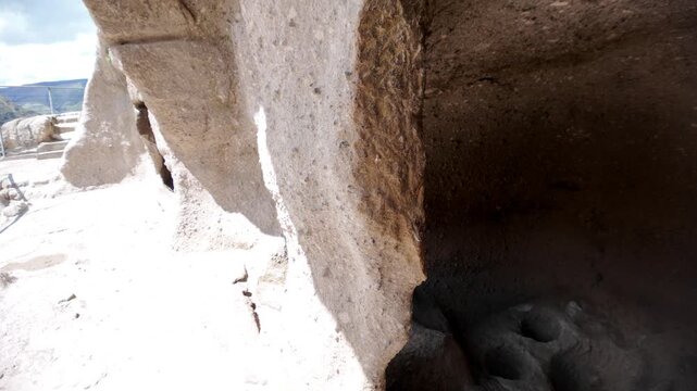 wine cellar of Vardzia cave monastery interior showing excavated storage facilities or qvevri, part of the extensive medieval rock-cut settlement carved into Erusheti Mountain in Georgia