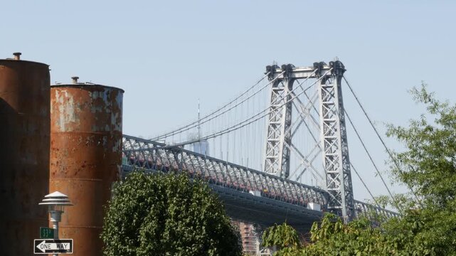 Williamsburg Bridge in Brooklyn, New York City, United States. Transport metallic bridge near Marcy Av subway station and Domino park in Williamsburg.