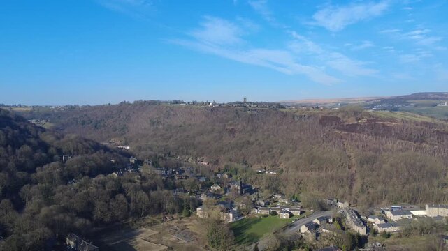 high aerial view of the Calder valley showing part of Hebden Bridge and the village of Heptonstall on a bright winter day