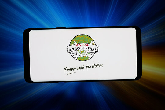 Stuttgart, Germany - 06-22-2026: In this photo illustration, the logo of company PT Astra Agro Lestari Tbk (AAL) is displayed on a smartphone in front of abstract background on computer screen.