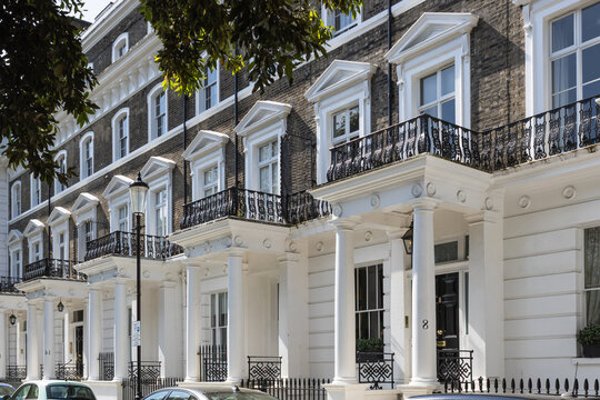Classic London townhouses with white stucco porticos