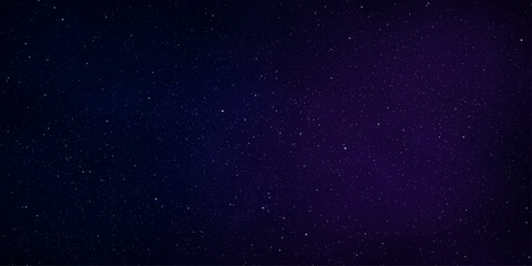 A mesmerizing expanse of the night sky, dusted with countless stars, reveals the deep blue and violet hues of the cosmos. © RD Visuals