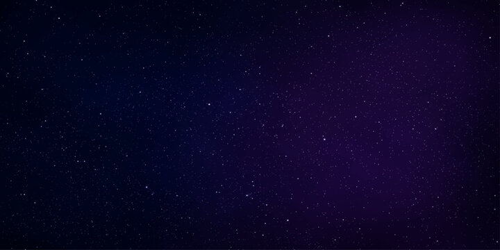 A mesmerizing expanse of the night sky, dusted with countless stars, reveals the deep blue and violet hues of the cosmos.