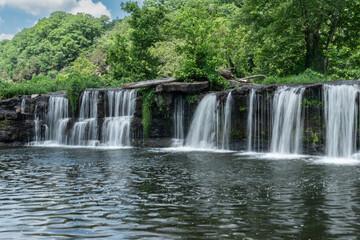 Wide Waterfall Cascades Along Mountain River © Slobodan