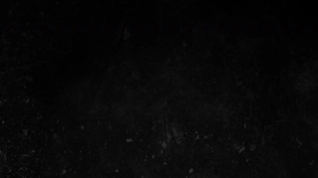 Motion grunge gritty old film, overlay effect, with noise, grain, negative film, old film grunge on black background. 4k video