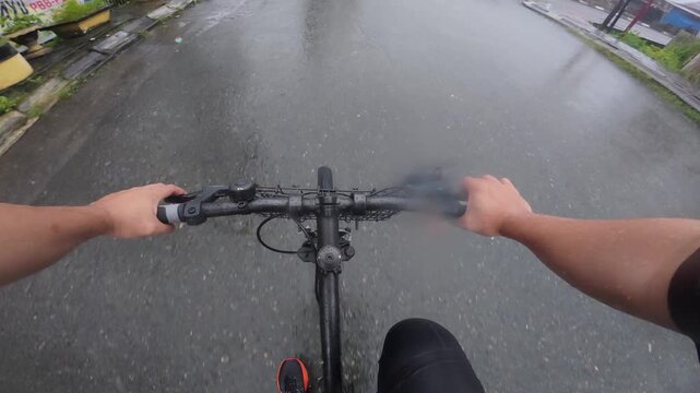 POV Riding a Bicycle in the Rain