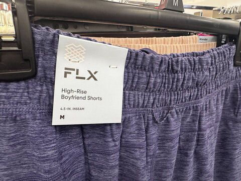 Mesa, Arizona - June 27, 2026: Close up of a FLX brand label on a women's clothing shorts, sold at Kohls