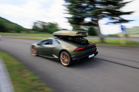 Koprivnice, Czech Republic, Czechia - 31 June, 2026: Sports car Lamborghini Hurac&aacute;n on the road and racing circuit. Fast car, auto and automobile. Speed and heavy panning motion blur.