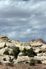 Fototapeta premium Vertical panorama of intriguing landscape and dramatic sky along Temple Mountain Road, near Goblin Valley State Park in Utah