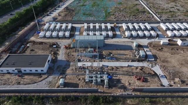 Construction site of a energy storage power station in Rizhao with rows of battery containers and supporting facilities