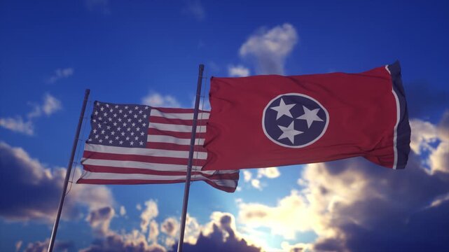 American And Tennessee Flags Waving Against Dramatic Sunset Sky