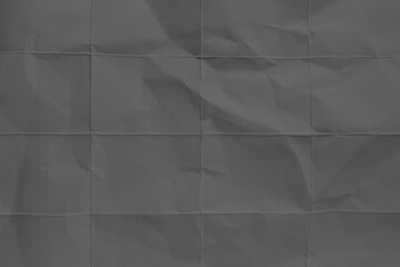 Obraz premium Dark gray crumpled paper texture background with folded grid