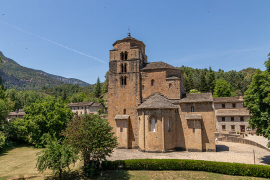 Santa Cruz de la Seros, Spain. Romanesque church of Santa Maria, sole remnant of an 11th-century convent for noblewomen of the Aragonese royal family, with its tall square tower and triple apses