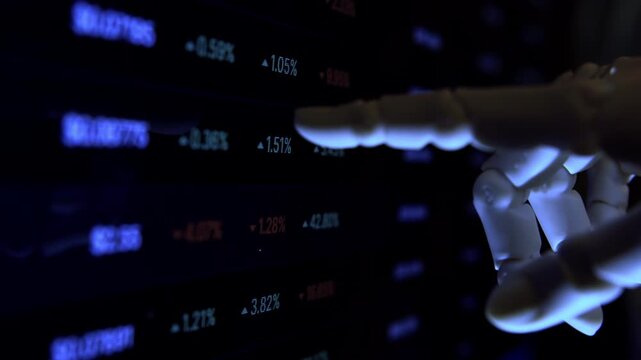 Robotic humanoid hand analyzing market statistics on PC display. Advanced AI technology in modern life close-up in dim light.