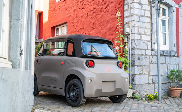 New 2026 Citroen Ami electric microcar parked in a small french town