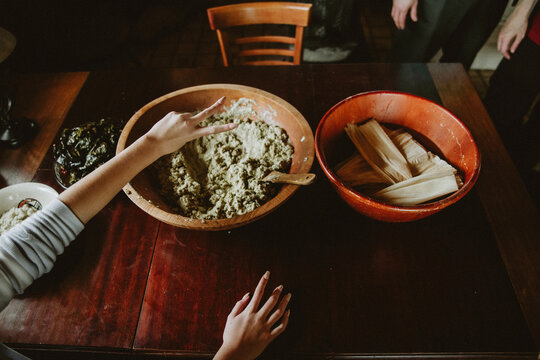 cooking and preparing food,  tamales 
