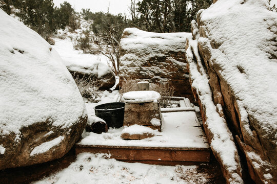 Outdoor Latrine Covered in Snow