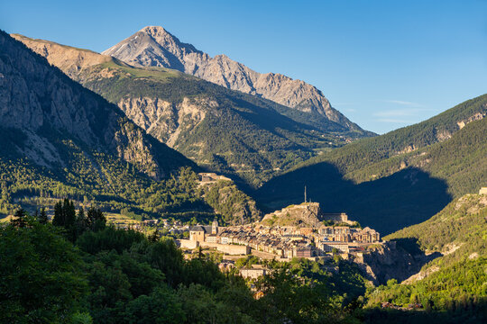 Elevated sunset view of the historic fortified town of Briancon, a UNESCO World Heritage Site in the Durance Valley, Hautes-Alpes. France