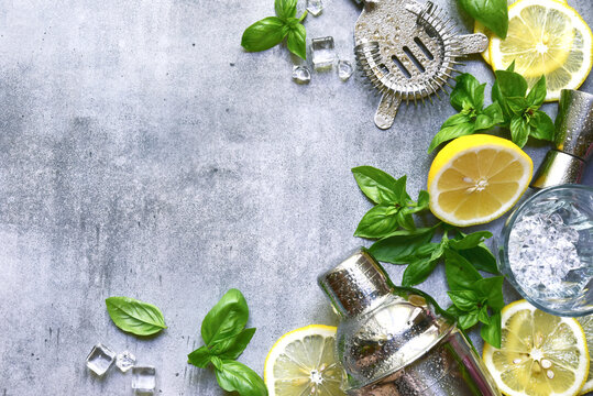 Ingredients fo making cold summer lemon and basil cocktail. Top view with copy space.