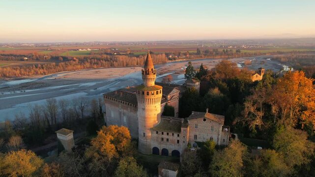 Drone view footage of the historic Castello di Rivalta in Piacenza, Emilia-Romagna, captured with its medieval towers, stone walls, and village setting&mdash;ideal for travel, heritage