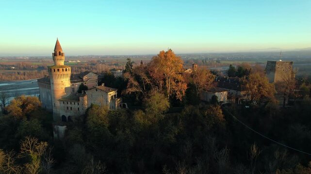 Drone view footage of the historic Castello di Rivalta in Piacenza, Emilia-Romagna, captured with its medieval towers, stone walls, and village setting&mdash;ideal for travel, heritage