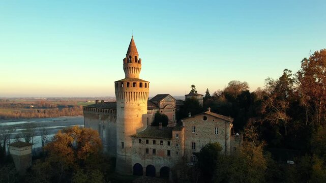 Drone view footage of the historic Castello di Rivalta in Piacenza, Emilia-Romagna, captured with its medieval towers, stone walls, and village setting&mdash;ideal for travel, heritage
