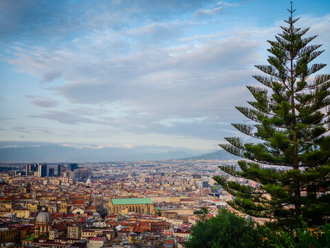 Aerial drone view of Naples old town panorama, scenic cityscape of historic center and iconic volcano view in Italy