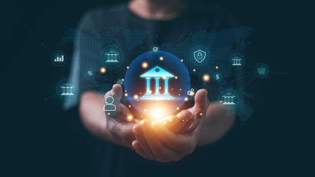 Digital banking and financial technology concept. Hands holding virtual bank icon with global network connections. Online banking, fintech innovation, secure financial services, digital payments.
