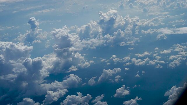 4K Motion landscape sky Aerial view summer tropical blue sky fluffy white cloud summertime sunny day cloudscape. Cumulus blue skyline spring sunlight climate background. Heaven environment