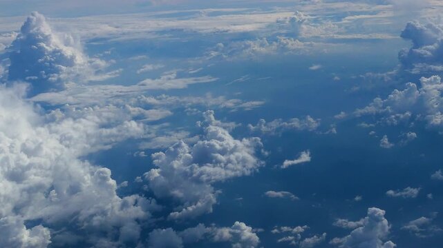 4K Motion landscape sky Aerial view summer tropical blue sky fluffy white cloud summertime sunny day cloudscape. Cumulus blue skyline spring sunlight climate background. Heaven environment