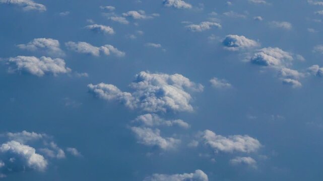 4K Motion landscape sky Aerial view summer tropical blue sky fluffy white cloud summertime sunny day cloudscape. Cumulus blue skyline spring sunlight climate background. Heaven environment