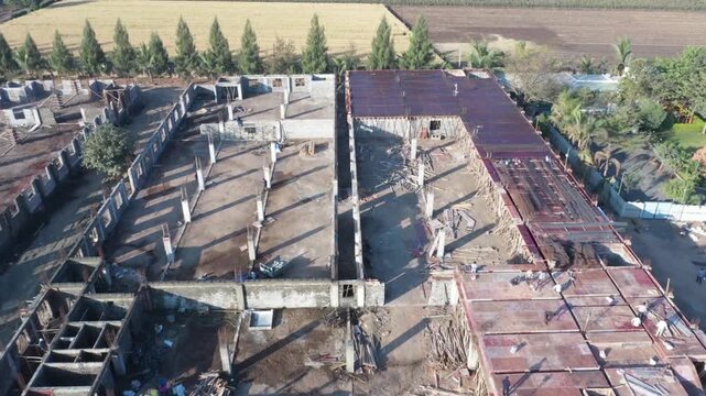 High vantage point aerial drone view focusing directly onto a sprawling institutional multi