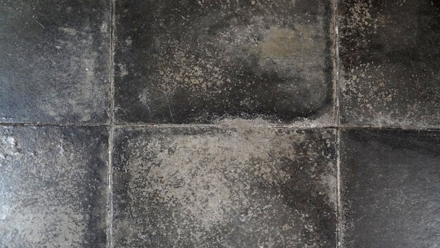 Weathered and Worn Dark Grey Bluestone Pavement Tiles