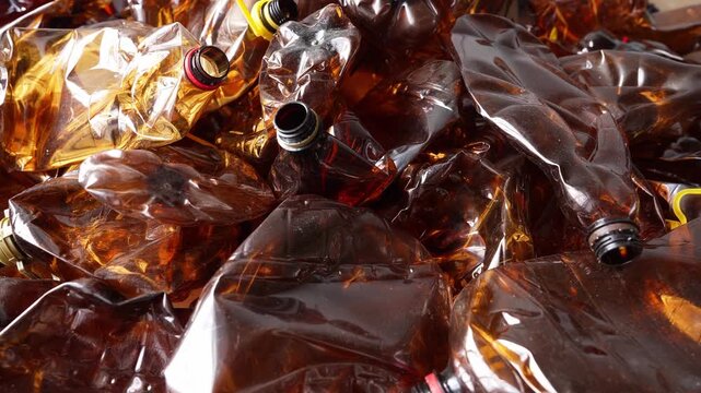 Brown PET bottle recycling. Plastic waste