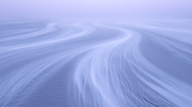 Wind-sculpted patterns on a snow-covered surface.